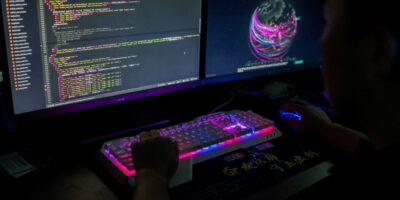 Computer security in APAC needs a reboot, with these 8 trends in mind - Prince, of the Red Hacker Alliance monitors global cyberattacks on his PC (Photo by NICOLAS ASFOURI / AFP)
