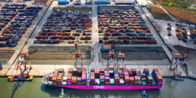 Top view aerial of International container port Tan Cang - Cai Mep. Ba Ria, Vung Tau, Vietnam. Connect to Ho Chi Minh City by Thi Vai river and national road 51