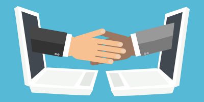 Blockchain concept with handshake from laptop screen