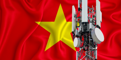 Vietnam flag, background with space for your logo - industrial 3D illustration. 5G smart mobile phone radio network antenna base station on the telecommunications mast emitting signal. 3D-rendering